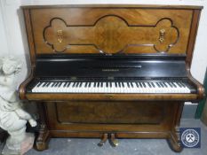 A walnut cased overstrung piano by Kiobenhavn