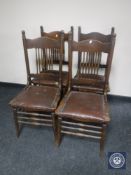 A set of four oak rail spindle back dining chairs