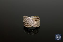 A 9ct gold baguette cut diamond cluster ring