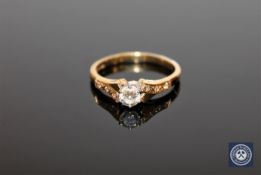 An 18ct gold diamond solitaire ring, approximately 0.4ct.