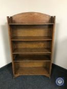 A set of oak Arts & Crafts open bookshelves