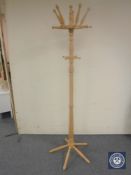 A pine hat and coat stand