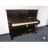 A mahogany cased overstrung piano by Bell of London