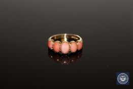 A 9ct gold coral ring,