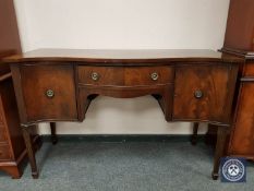 A 19th century serpentine fronted sideboard,