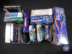 Three boxes of assorted board games, nuts and bolt engineering set,
