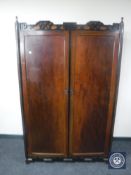 An Edwardian mahogany double door compactum wardrobe