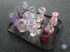A tray of twelve assorted Caithness glass vases