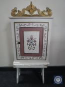 A hand-painted wall cabinet together with a painted pine cracket