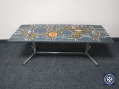 A mid 20th century Poole tiled top coffee table on chrome base CONDITION REPORT: A