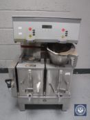 A stainless steel commercial coffee machine CONDITION REPORT: The coffee machine