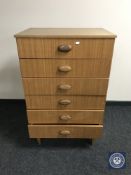 A mid 20th century teak six drawer chest