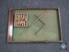 An early 20th century counter top bar skittles game