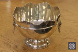 An Edwardian silver rose bowl with lion mask handles, height 14.