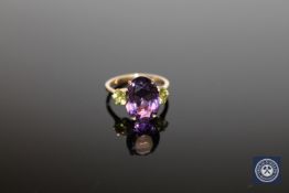 A 9ct gold amethyst and peridot ring,