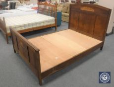 A 5' oak French bed frame