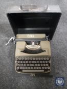 A cased mid 20th century Erika typewriter