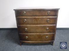A 20th century Georgian style four drawer chest