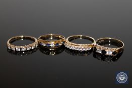 Four 9ct gold rings.
