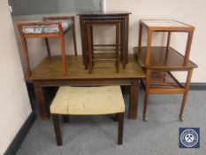 A nest of three Danish tiled topped tables,