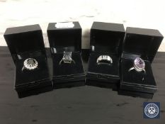 Four sterling silver dress rings
