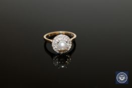A 9ct gold pearl and diamond cluster ring,