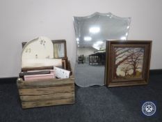 A vintage wooden crate of pictures and prints,
