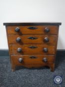An antique inlaid mahogany apprentice piece miniature four drawer chest CONDITION