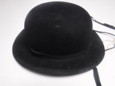 A bowler hat by Linkoln Bennett & Co.