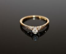 An 18ct gold platinum set diamond solitaire ring size M, approximately 0.2ct.