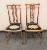 A pair of inlaid mahogany late Victorian bedroom chairs, width 42 cm.