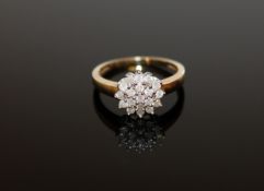 A 9ct gold diamond cluster ring, size O, approximately 0.5ct.