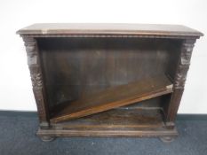 A set of continental oak open bookshelves on bun feet