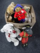 A box containing a quantity of teddy bears including Harrods bears and Paddington