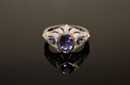 A 14ct white gold tanzanite, sapphire and diamond Art Deco style ring,