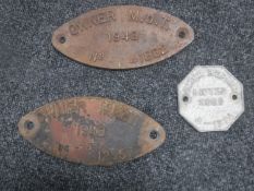 Three cast iron railway plaques