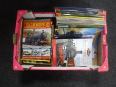 A box containing assorted railway catalogues,