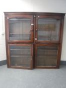 A Victorian mahogany glazed bookcase with four glazed panel doors,