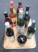 A tray containing nine bottles of assorted alcohol and spirits including Baccardi, port,