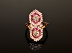 A 14ct rose gold ruby and diamond ring, with two brilliant-cut diamonds totalling 0.