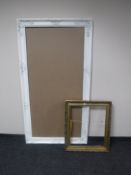 A large painted picture frame together with a gilt frame