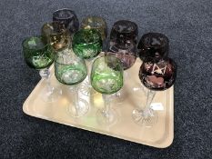 A tray containing eleven assorted two-tone crystal wine glasses