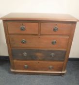 A Victorian oak five drawer chest