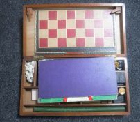 An Edwardian wooden cased games compendium