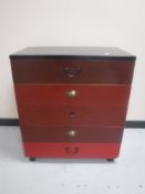 A 20th century five drawer painted chest