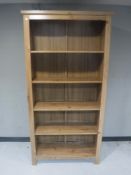 A set of contemporary pine open bookshelves