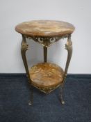 A gilt metal and marble two-tier plant stand