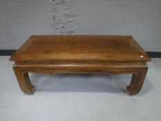 An oriental style rectangular coffee table