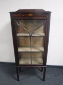 A Victorian inlaid mahogany display cabinet