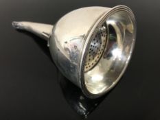 A rare George III silver wine funnel with liner hallmarked London 1806 and made a year after the